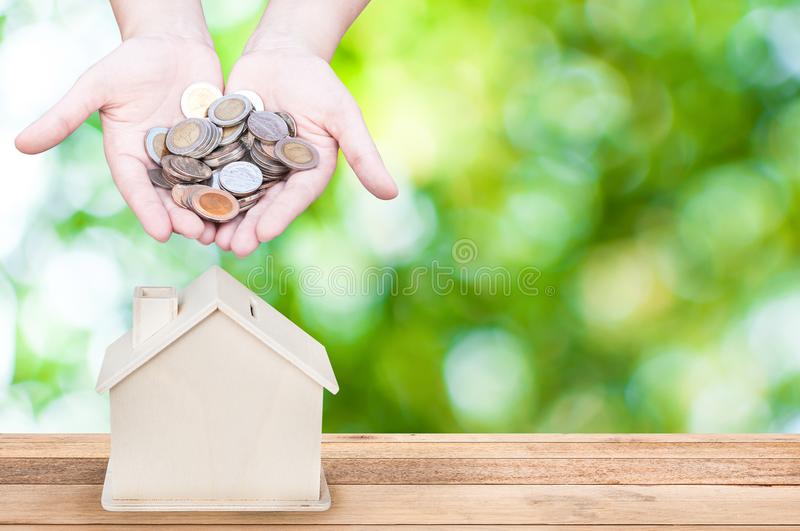 https://www.blogarts.in/wp-content/uploads/2020/05/woman-hand-holding-coins-house-bank-save-money-green-nature-background-woman-hand-holding-coins-house-bank-save-money-green-nature-107453727.jpg